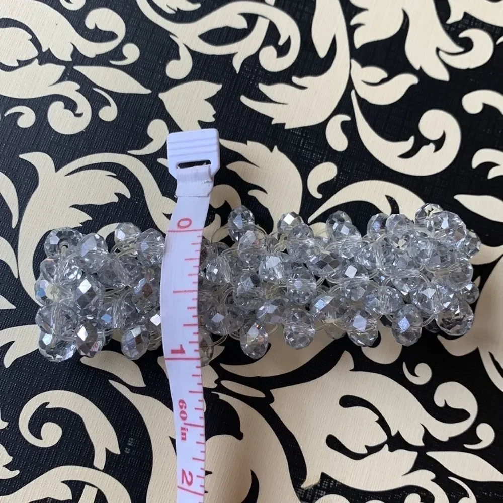 Clear, silver and iridescent beaded bracelet